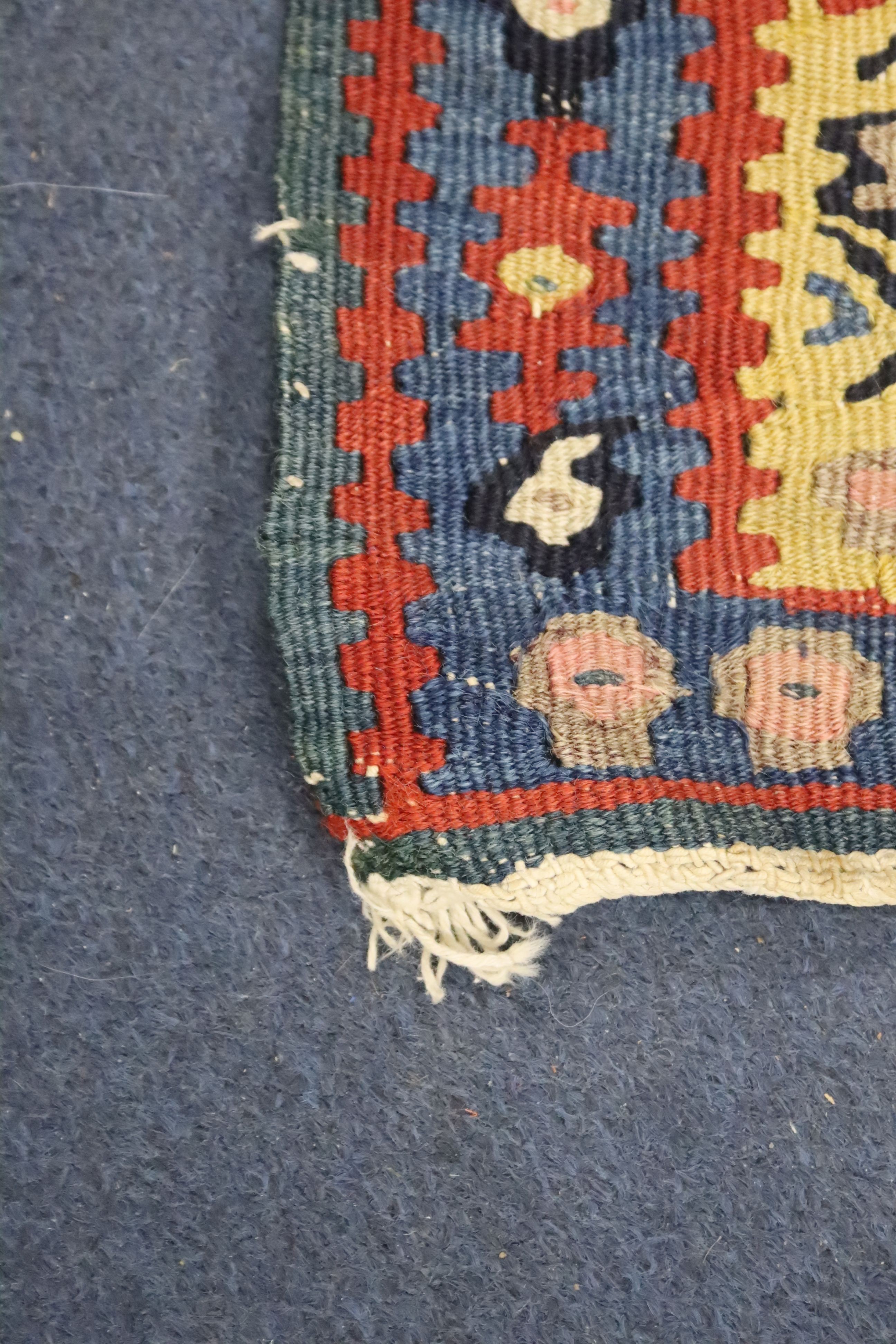 A late 19th century / early 20th century Senneh polychrome Kilim rug, 190 x 130cm